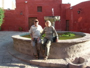 Arequipa, monastery Santa Catalina, the red district with fountain and two of the authors: Pirkko and Eberhard Hegewald