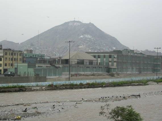 View to quarter Rimac and mountain San Cristobal in the backgound (with slums “pueblos jóvenes”), the inscription “Alan” is the name of a politician because of election