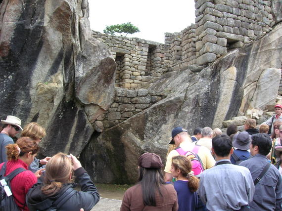 Machu Picchu, the temple of the condor (the typical view with tourists)