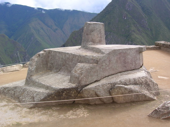 Machu Picchu, the sacred sun dial or Intihuatana“.	 