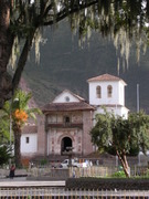 Church of Andahuaylillas, jn front a tree with hanging mats of â€œspanish mossâ€� (Tillandsia)