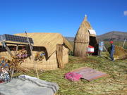 Lake Titicaca, a floating village of the Uros tribe, modern life: solar cells and post office